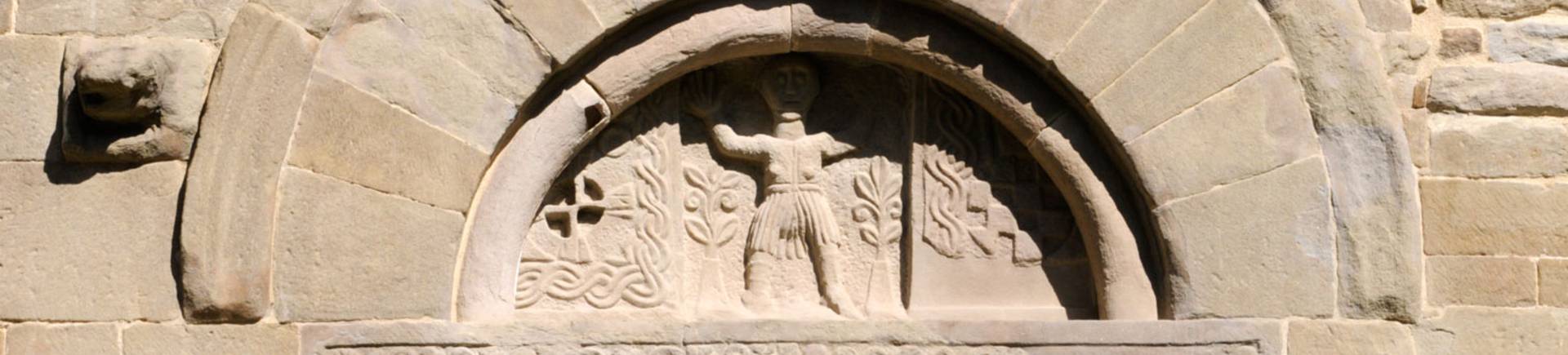 Badia or Abbey of Santa Maria in Montepiano, detail of stone archway above main entrance detail of stone archway above main entrance